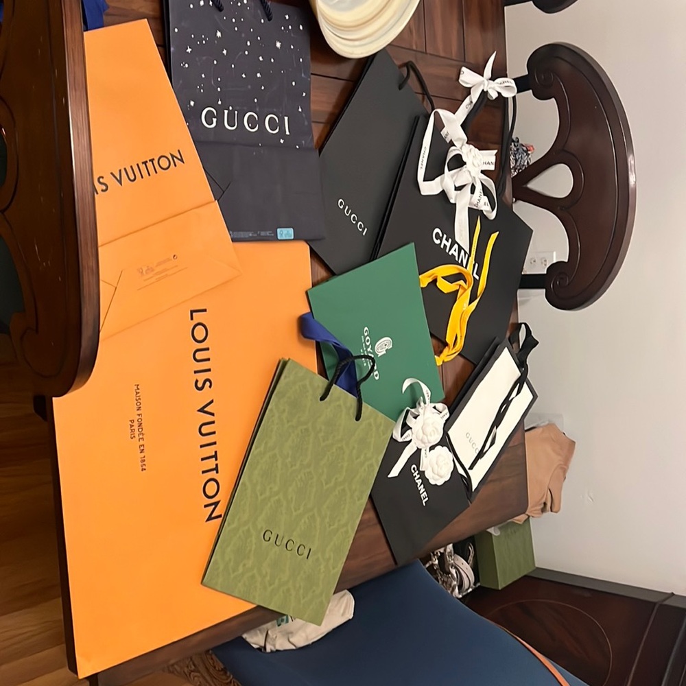Lot of designer shopping bags in great condition.